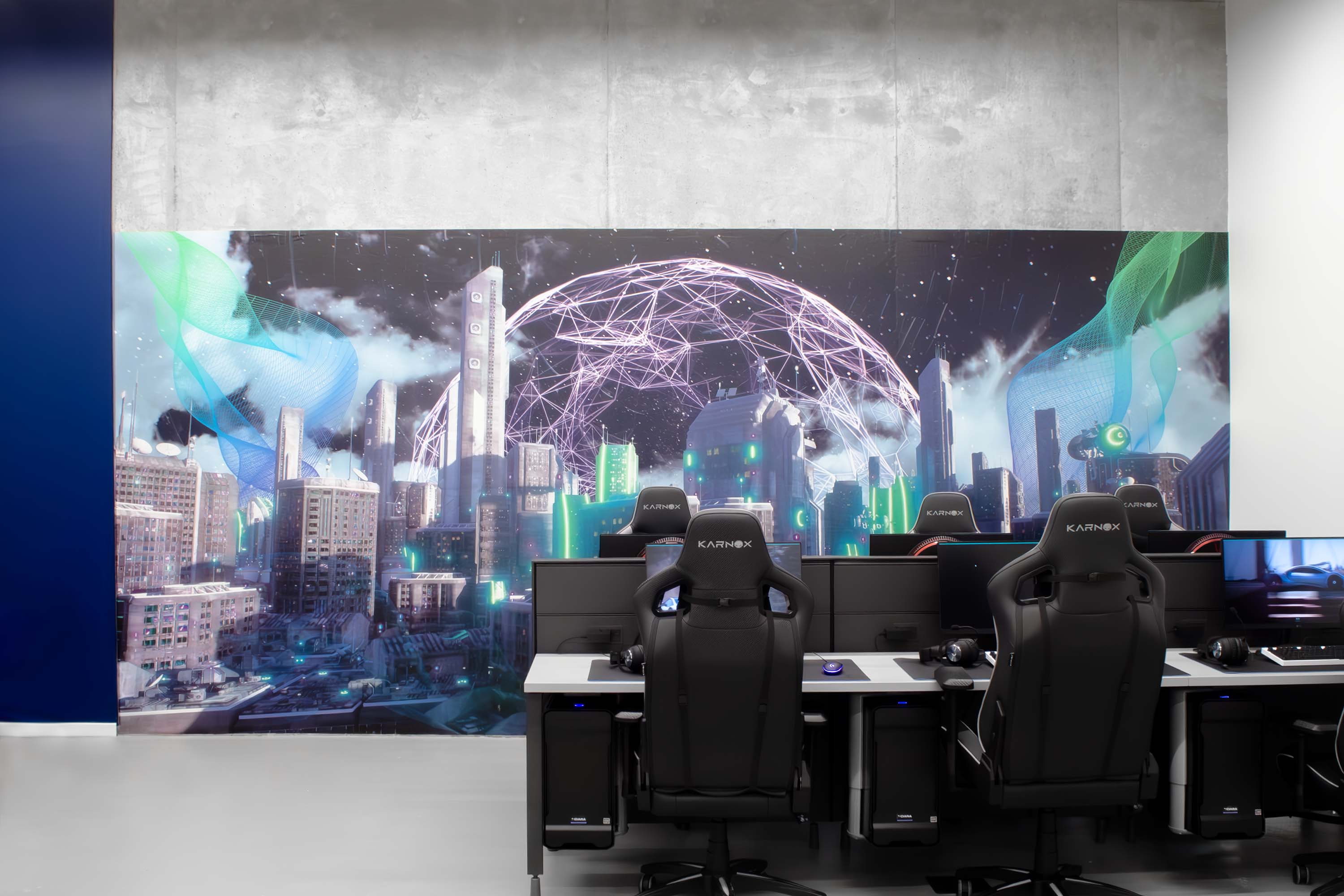 A view of the mural head-on, slightly obstructed by the computer stations.